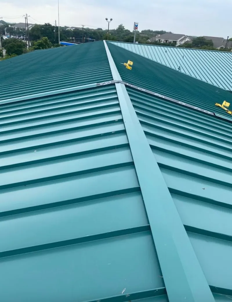 Green commercial metal roof ridge and valley for Metal Roof Repair in Fortuna